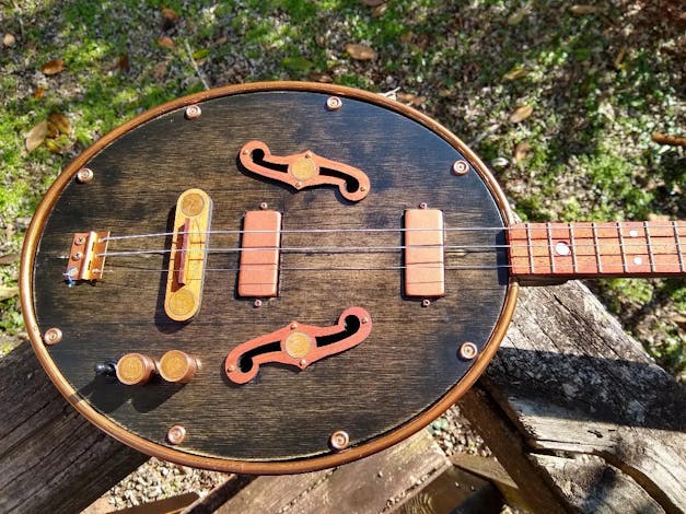 "Thin Ones" Cigar Box Guitar Bridge with vintage U. S. Wheat Pennies